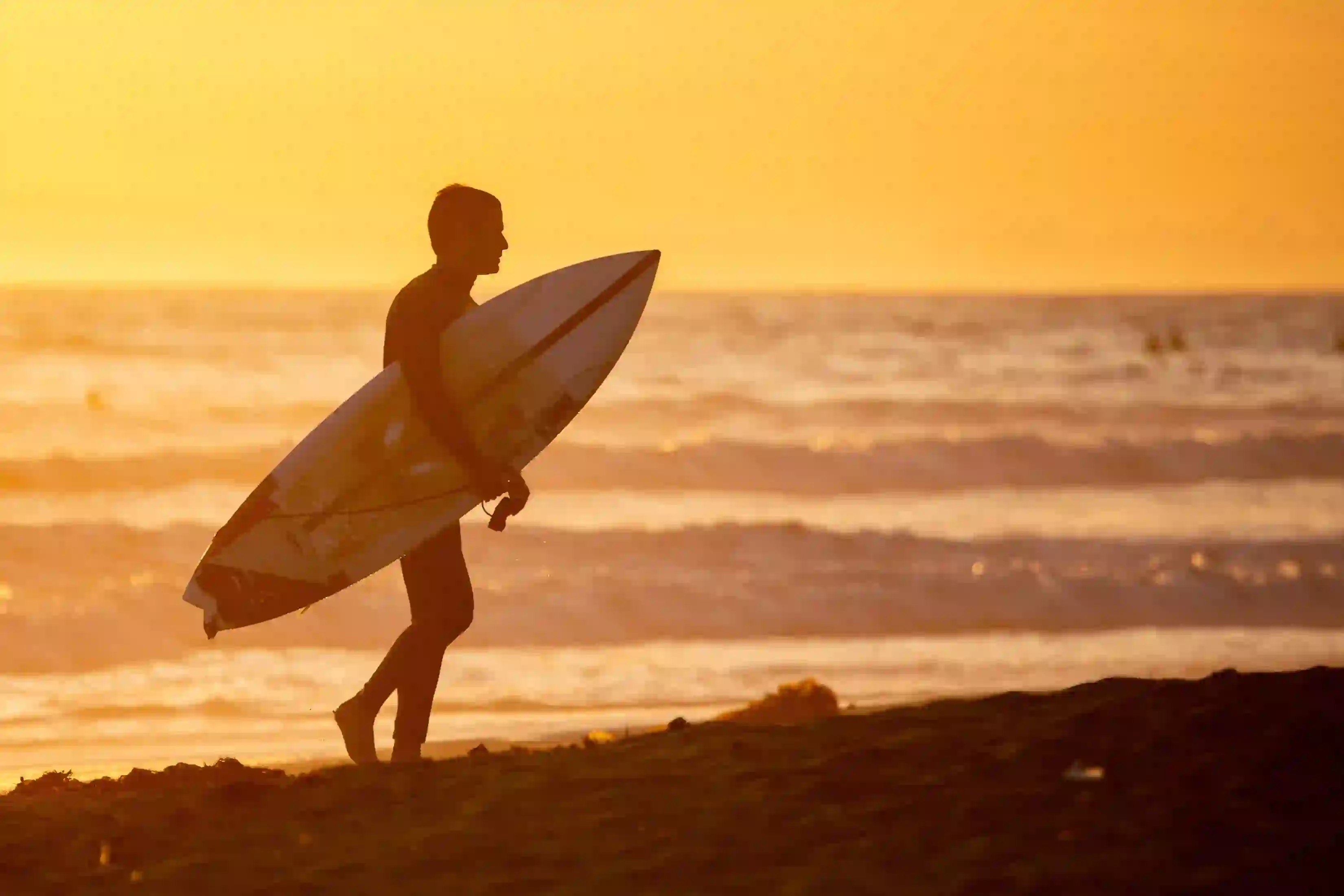 Surfer at Sunset | iPhone Notification using Reactjs, Vite, Tailwindcss, Twin.Macro